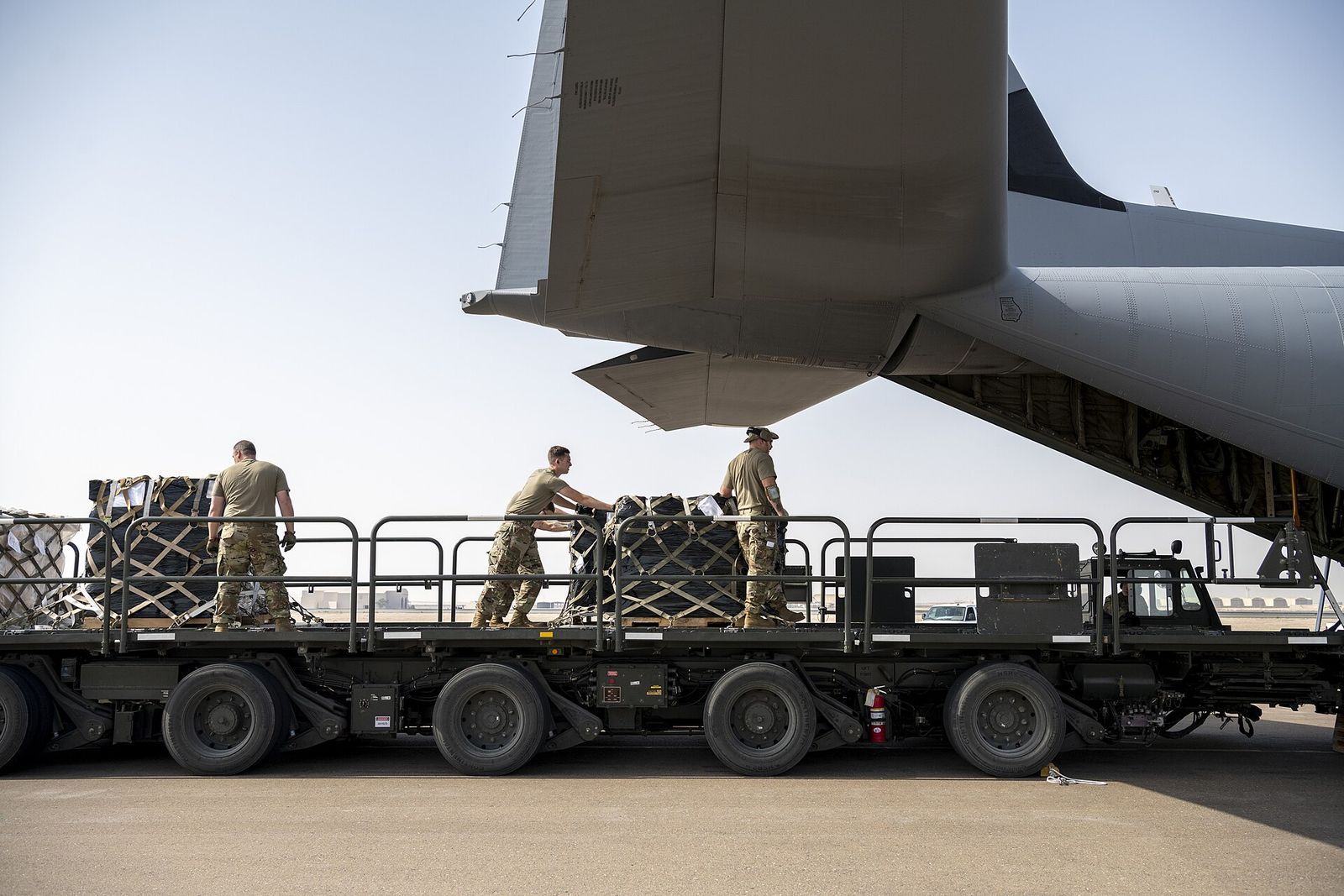 Palletised air cargo being loaded onto a freighter aircraft